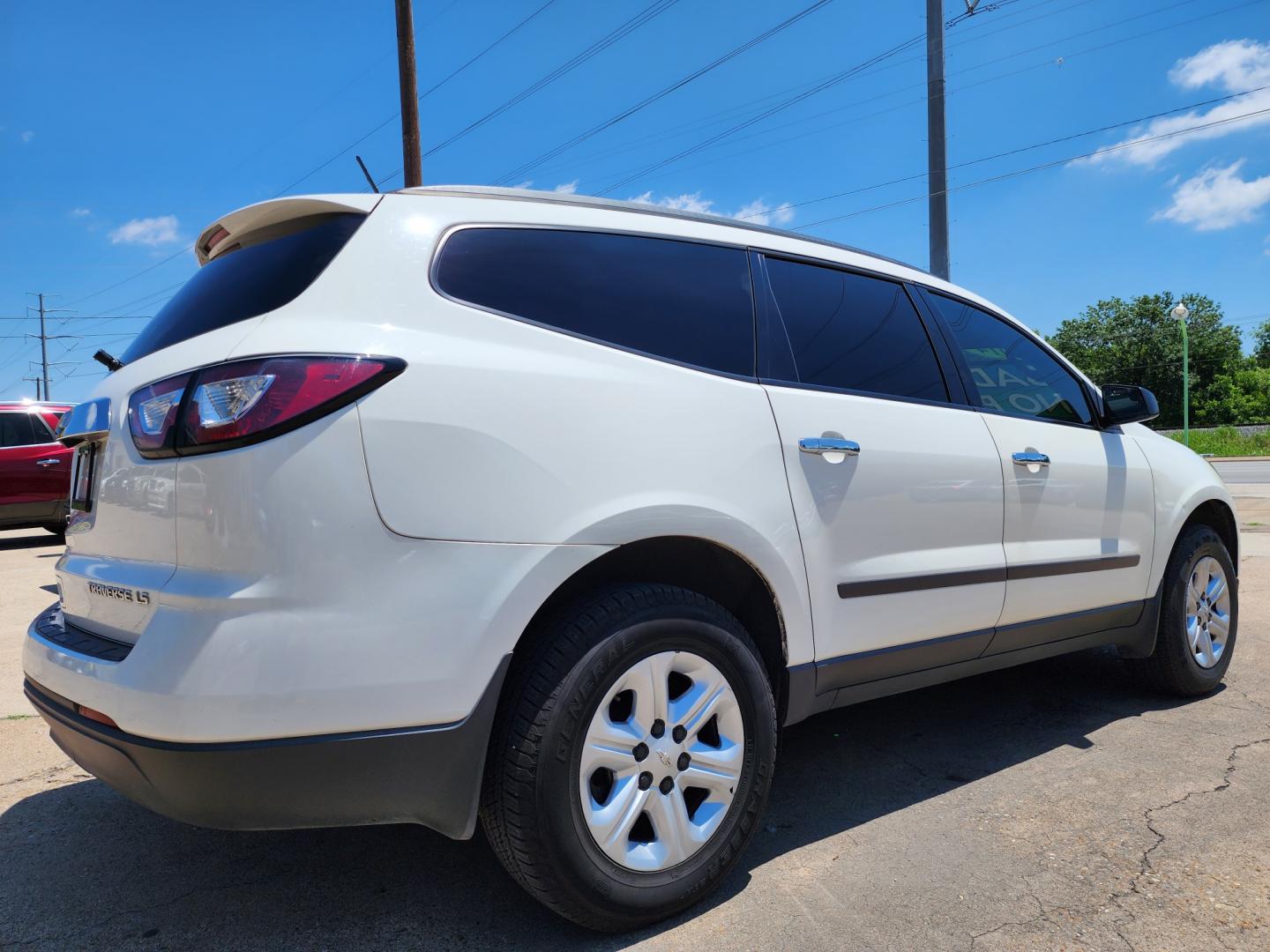 2014 WHITE Chevrolet Traverse LS w/PDC (1GNKRFED1EJ) with an 3.6L V6 DOHC 24V engine, 6-Speed Automatic transmission, located at 2660 S.Garland Avenue	, Garland, TX, 75041, (469) 298-3118, 32.885387, -96.656776 - CASH$$$$$$ TRAVERSE!! This is a very clean 2014 Chevrolet Traverse LS w/PDC SPORT UTILITY! 3rd Row Seating! Come in for a test drive today. We are open from 10am-7pm Monday-Saturday. Call us with any questions at 469.202.7468, or email us at DallasAutos4Less.com. - Photo#3